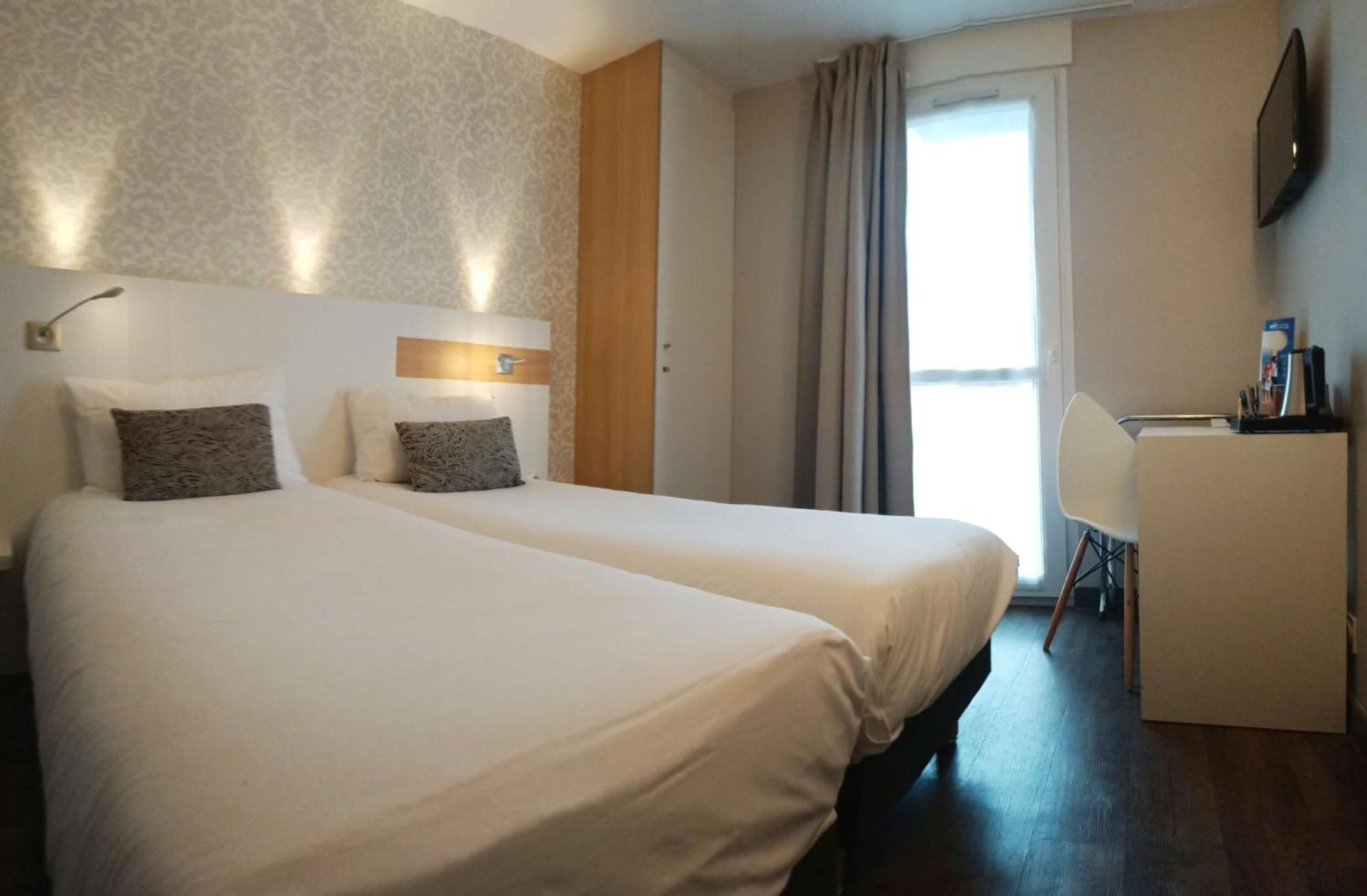 Brit Hotel Les Alizes Порник Екстериор снимка