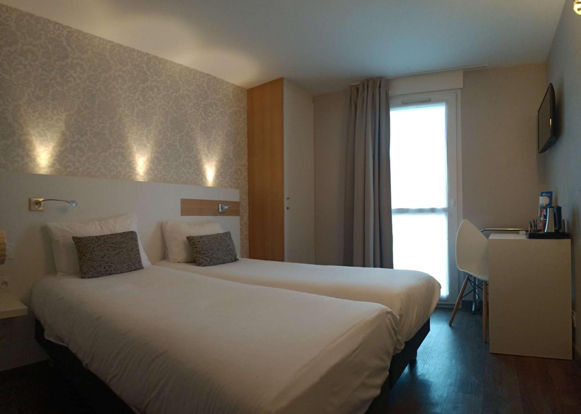 Brit Hotel Les Alizes Порник Екстериор снимка