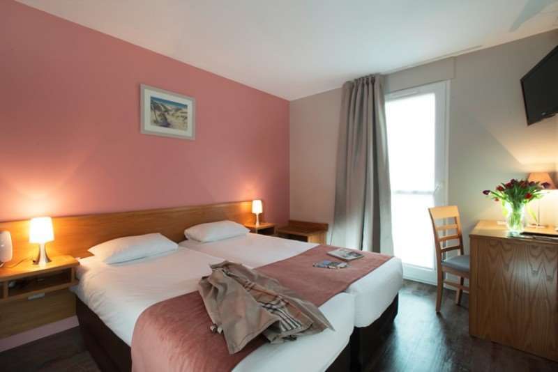 Brit Hotel Les Alizes Порник Стая снимка